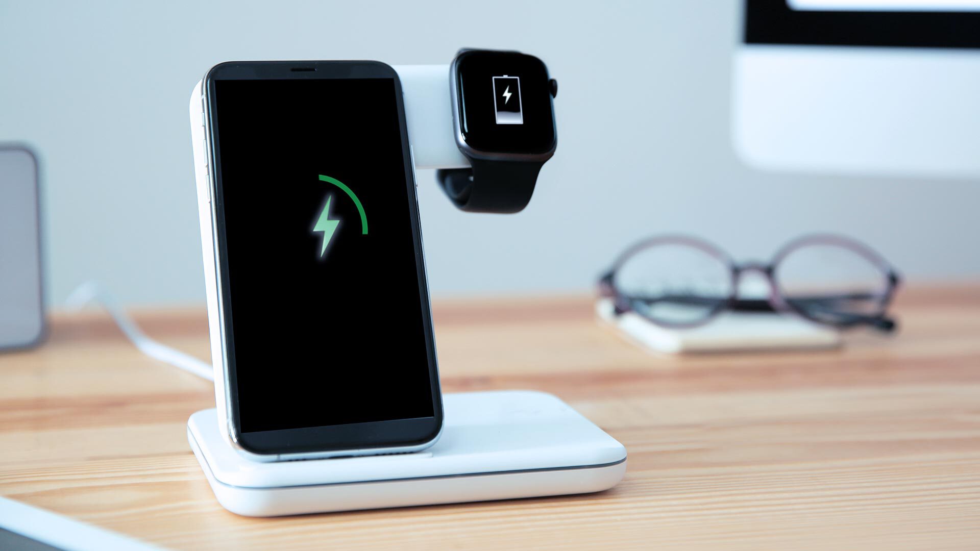 Charge a cell phone and a smartwatch Wirelessly by induction