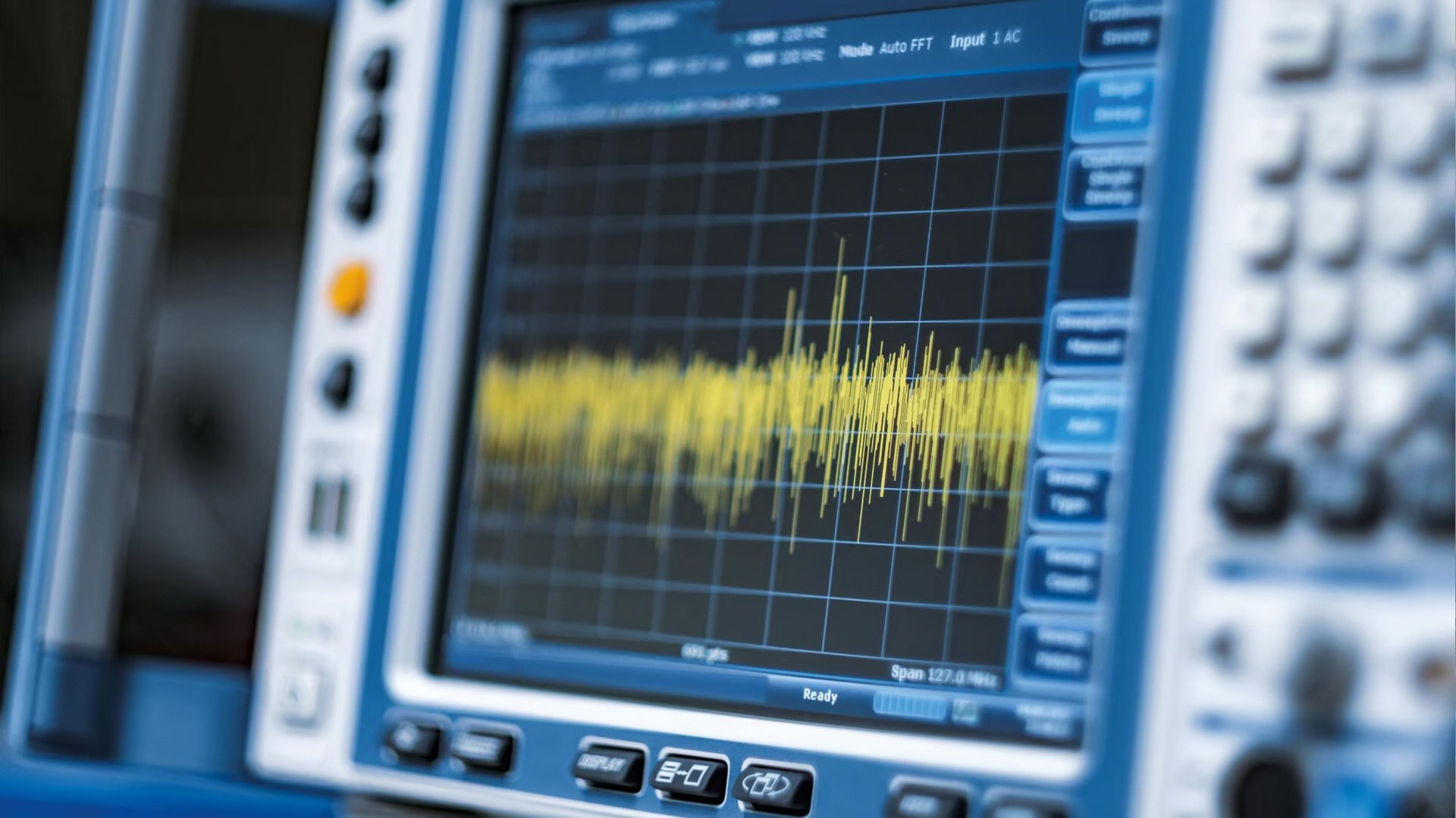 Close-up of an oscilloscope to illustrate product testing services for devices