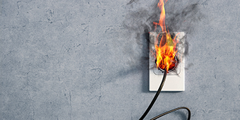 Fire and smoke at an electrical power outlet