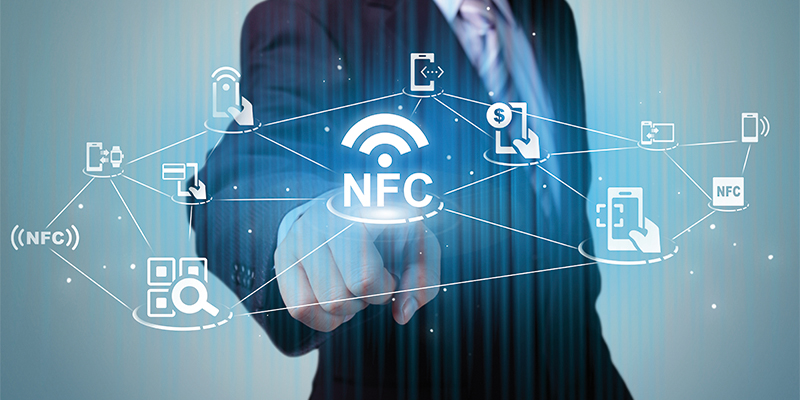 NFC technology Concept on smart phone and smart watch - Business Man touch on a touch screen interface